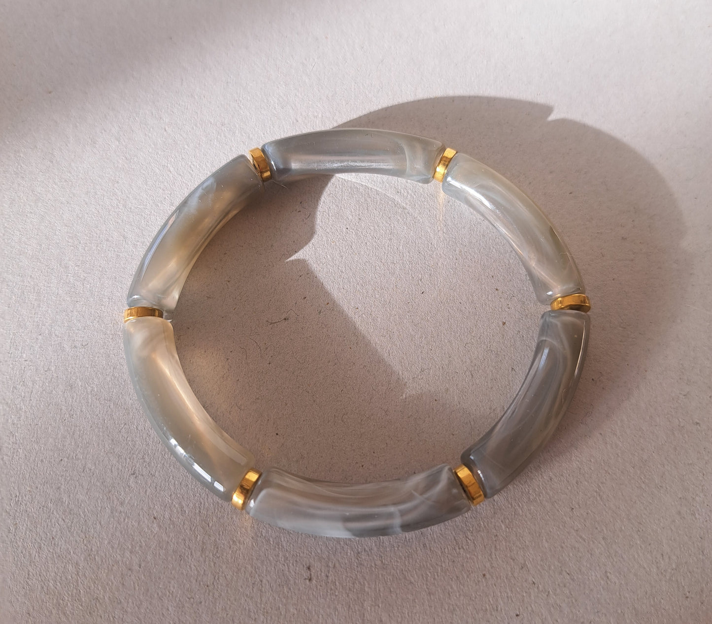 Set of 3 gray and cream resin bracelets