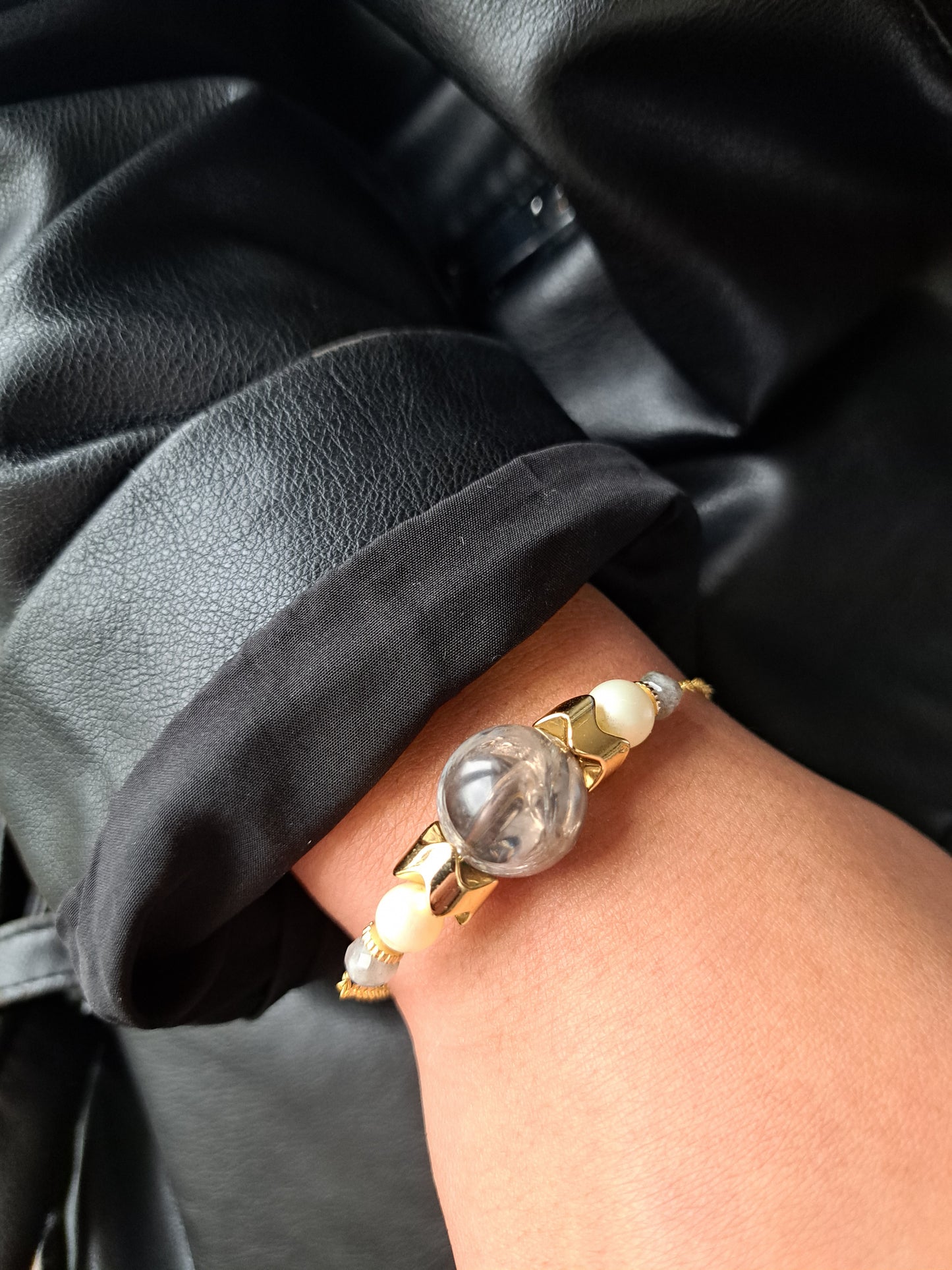 Second-hand gray and gold bracelet