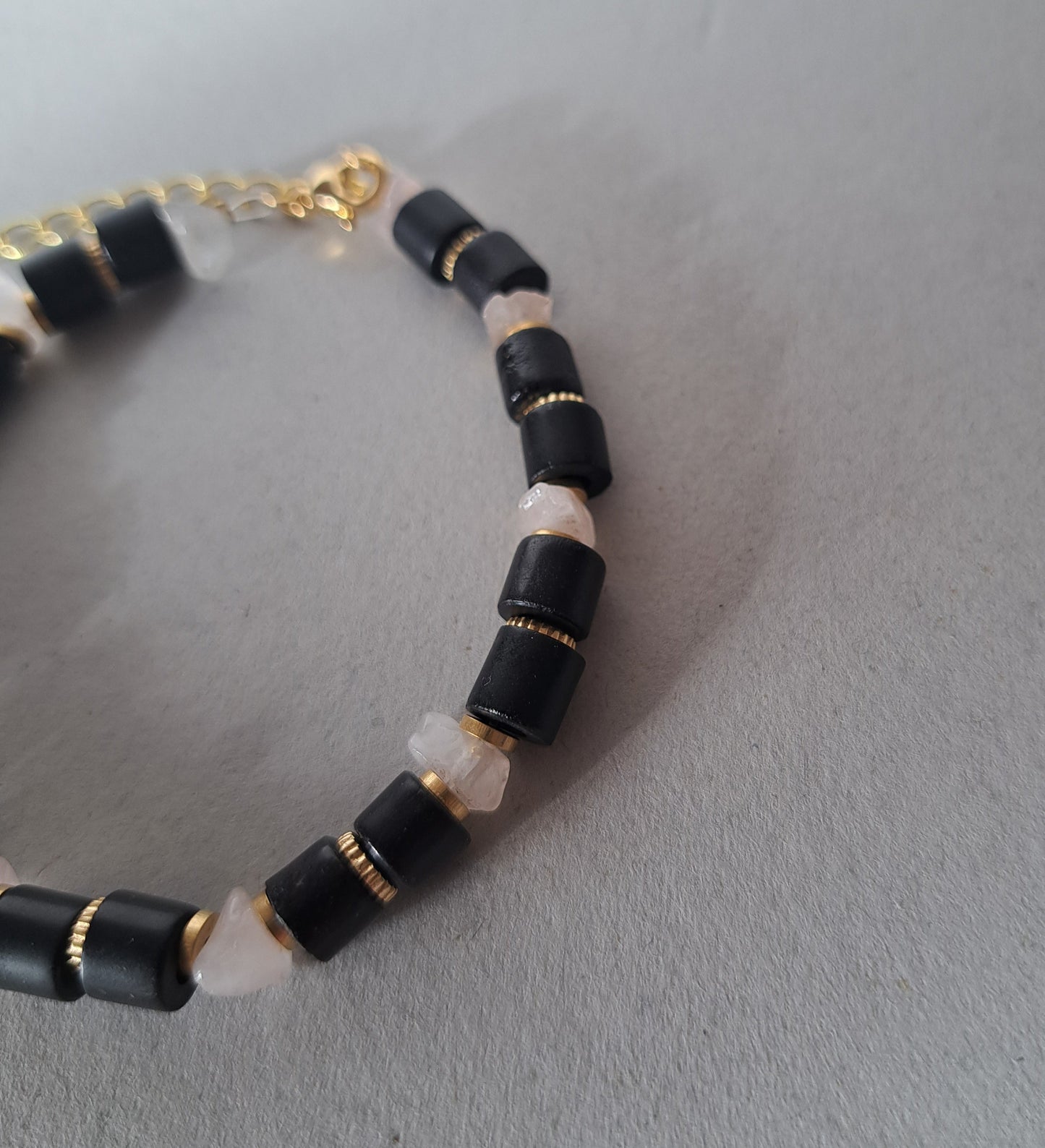 Black, pink and gold recycled bracelet