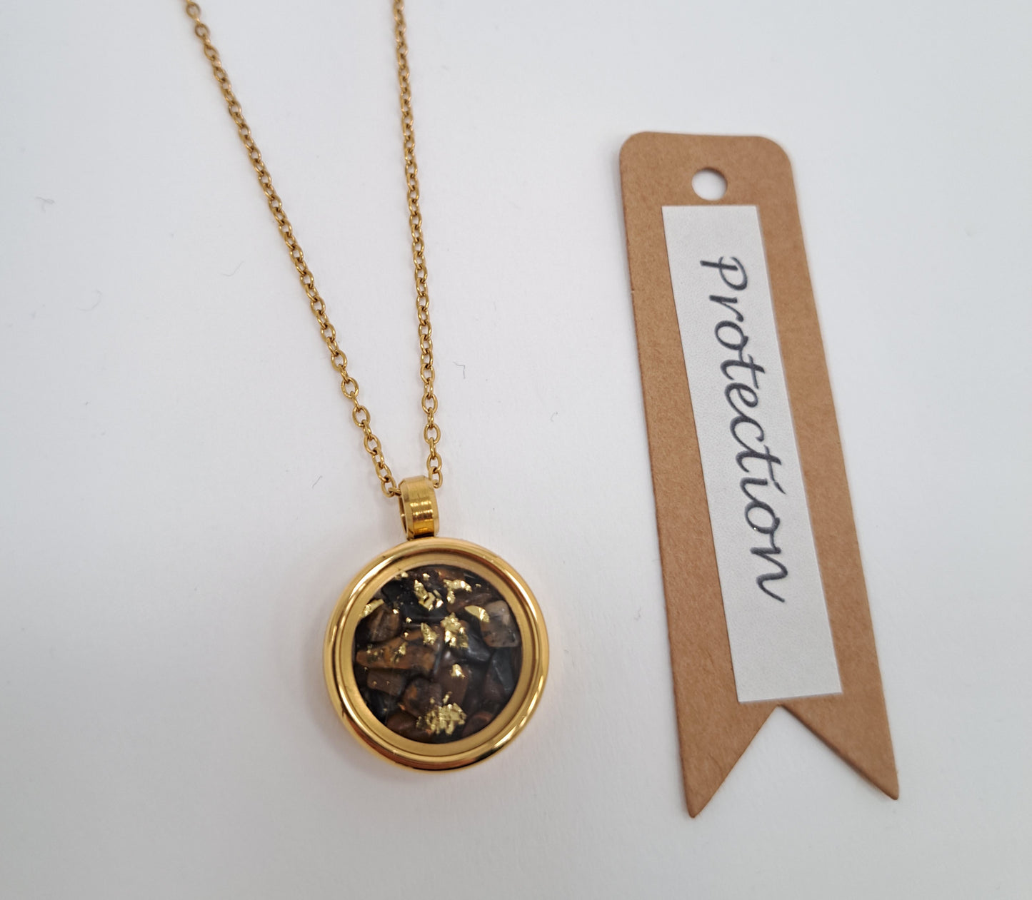 Collier médaillon pierres et feuille d'or