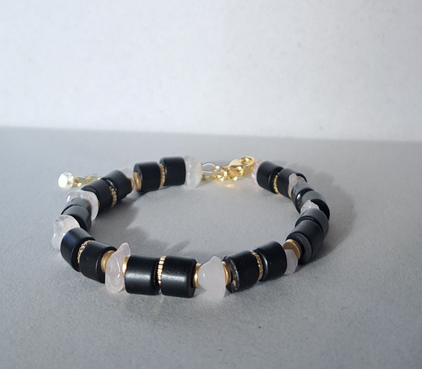 Black, pink and gold recycled bracelet