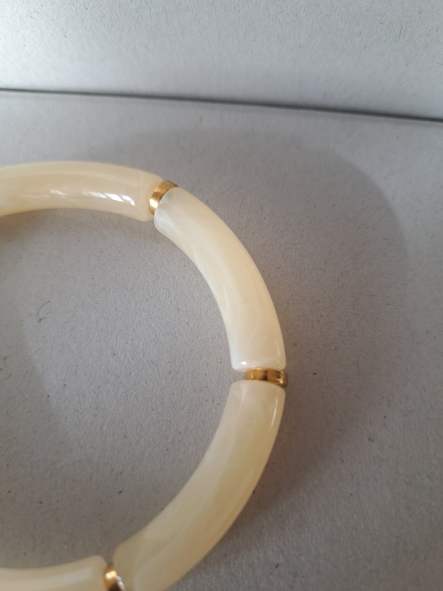 Ecru and gold resin bracelet